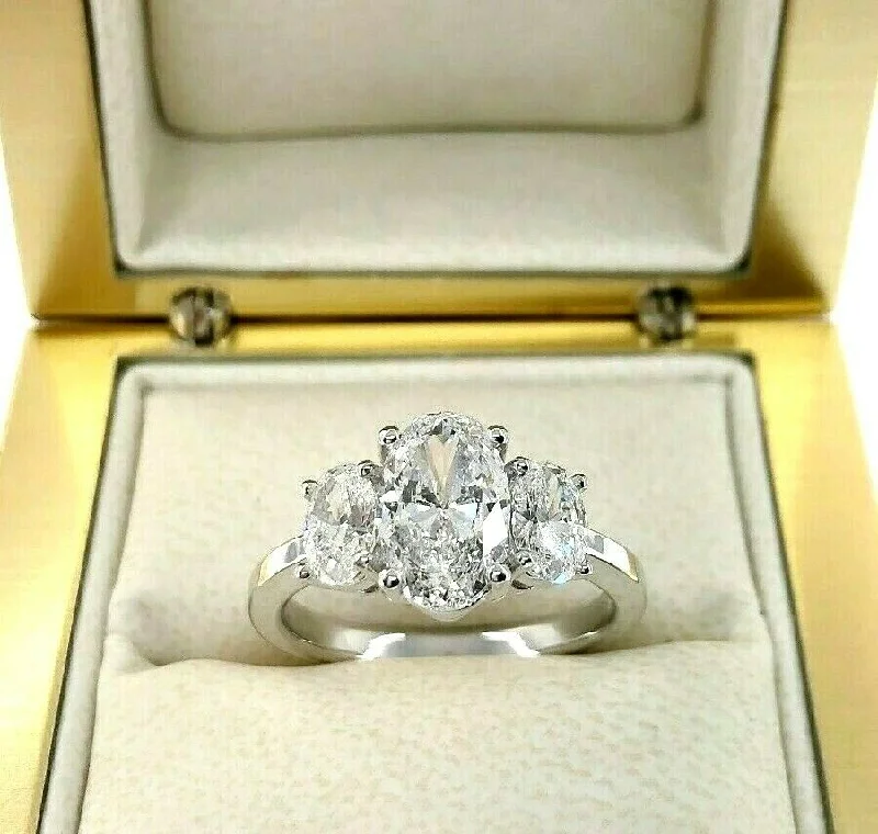 Channel Set Engagement Rings2.34 Carats 3 Oval Diamond Engagement Ring 1.50 Carat GIA D Color Center Stone