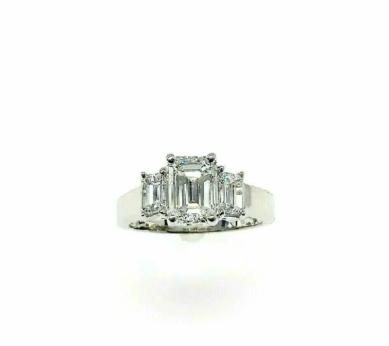 Second Hand Engagement Rings2.54 Carats t.w. 3 Stone Emerald Cut Diamond Wedding Ring GIA 1.64 G VVS2 Center