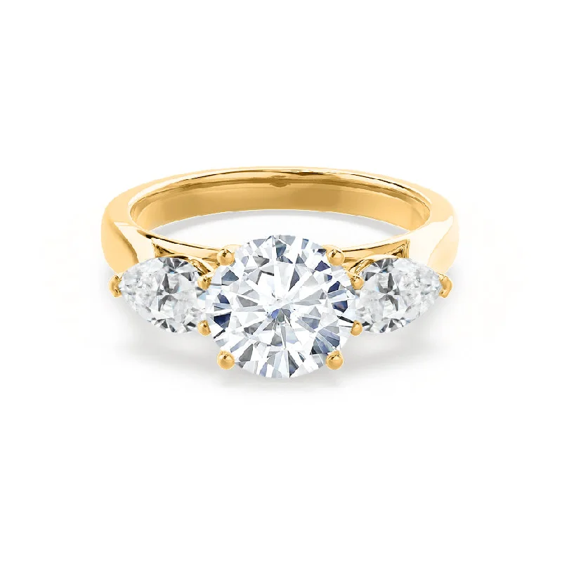 Sapphire Engagement RingsBLOSSOM - Round Moissanite & Pear Cut Diamond 18k Yellow Gold Trilogy