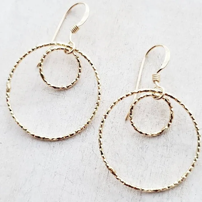 Vintage hoop earrings featuring classic round stone designs -Gold Double Circle Diamond Cut Earrings