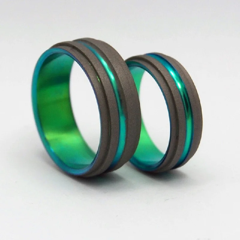 Rings made with eco-conscious stones for sustainability -Green Step Forward | Titanium Wedding Ring Set