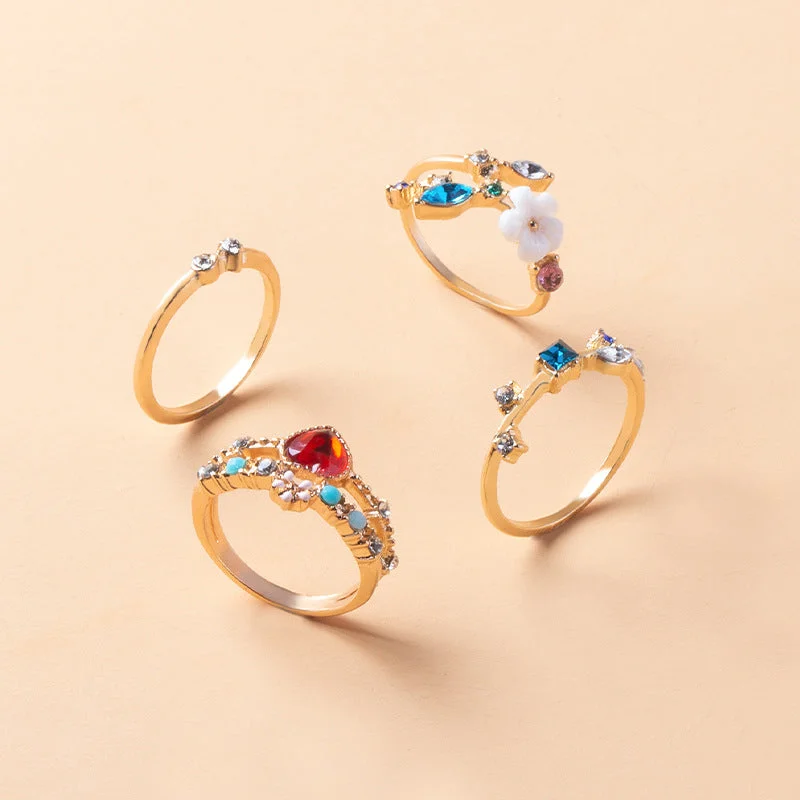 Stackable rings designed for fun finger layering style -Wholesale Opening Gold-plated Flower 4-piece Metal Ring Set