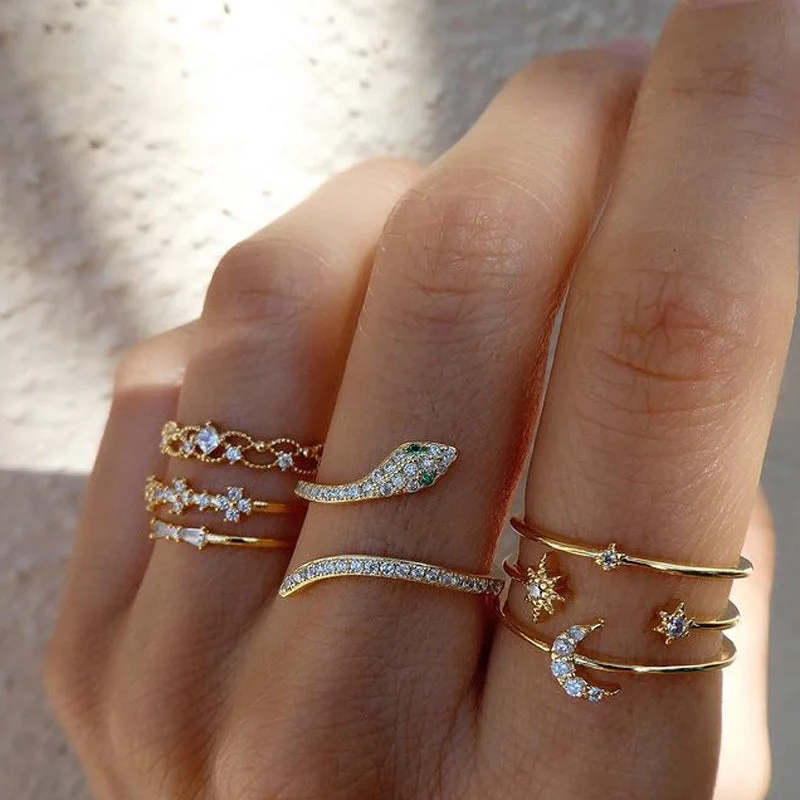 Gold rings adding bright shine to your fingers -Wholesale Refers To The 7-piece Combination Set of Stars, Moons, Gemstones, and Snake Shaped Rings