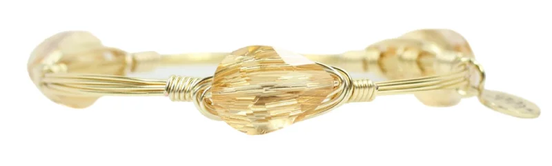 Classic gold bangles for women who love elegant, timeless accessory pieces -The Jaclynn Bangle Bracelet