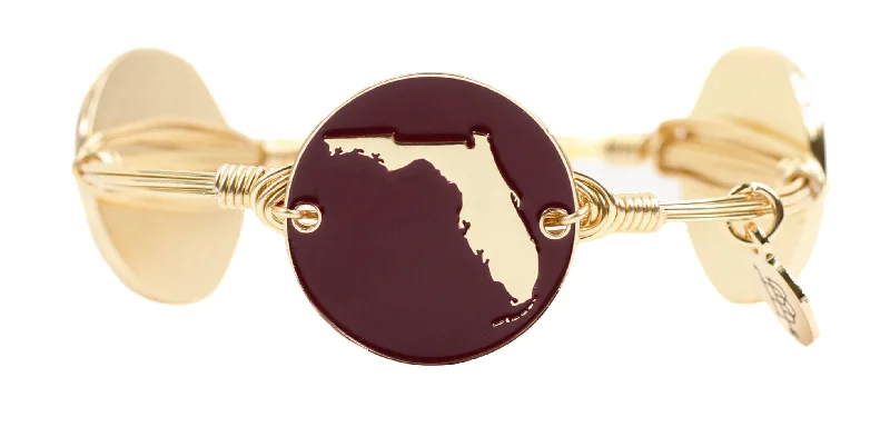 Fashionable stacked bracelets for a layered look with a mix of metals -State of Florida Bangle Bracelet - Garnet