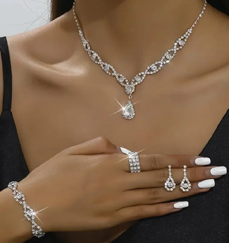 Modern geometric bangles with clean lines and unique shapes for contemporary style -4pcs SILVER Jewelry Set l Rhinestone Earrings l Necklace l Bracelet l Prom l Wedding JS-908