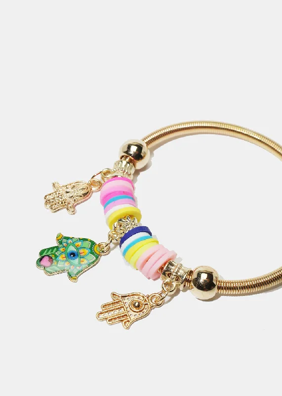 Trendy bangles with unique textures and patterns for a stylish accessory -Colorful Hamsa Hand Charm Coil Bracelet