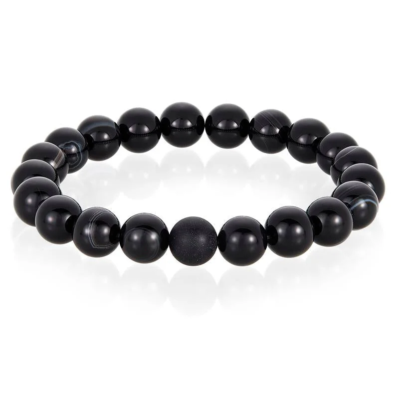 Fashionable stacked bracelets for a layered look with a mix of metals -Crucible Los Angeles Polished Black Banded Agate and Black Matte Onyx 10mm Natural Stone Bead Stretch Bracelet