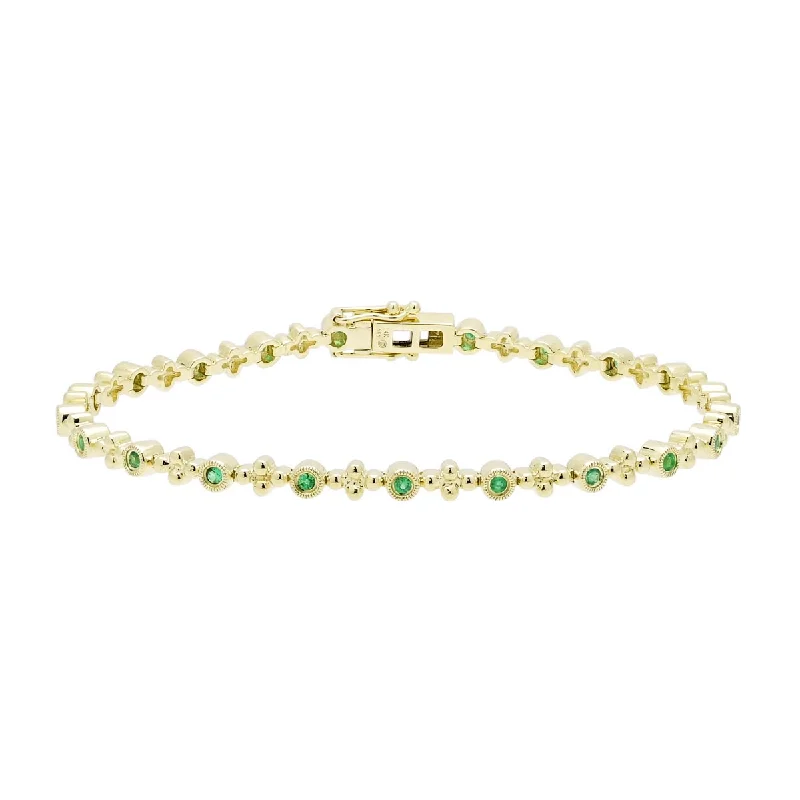 Wrap bracelets with leather cords and beads for a bohemian, relaxed style -Dabakarov Emerald Tennis Bracelet in 14kt Yellow Gold