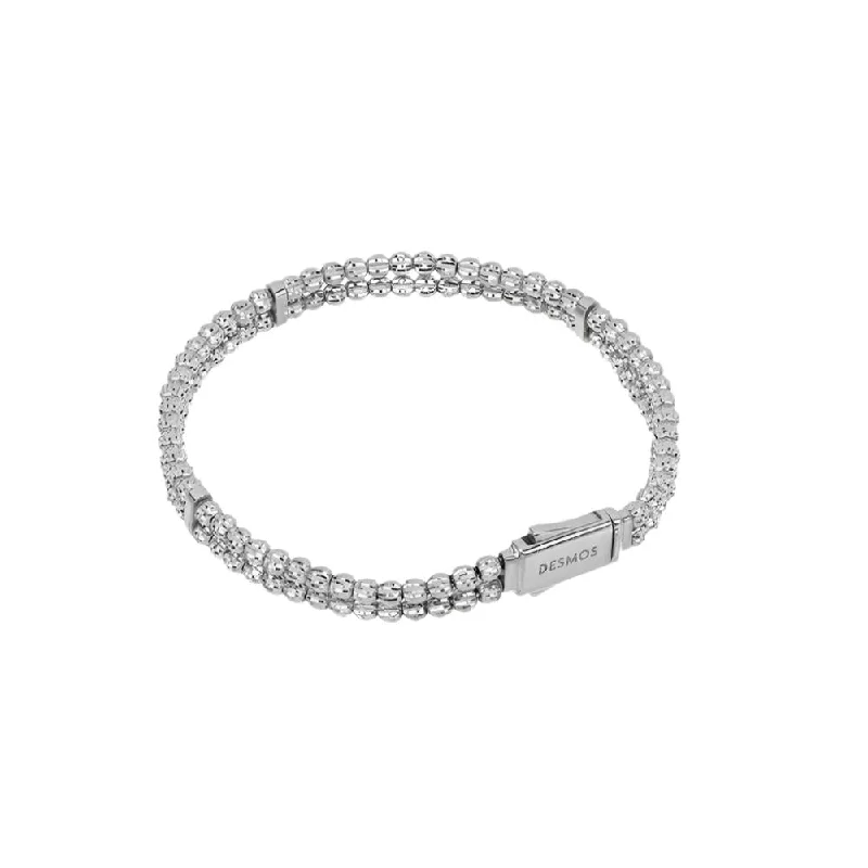 Classic tennis bangles with brilliant diamonds for a luxurious and timeless piece -Desmos "Crystal" Sterling Silver 2 Row Diamond-Cut Bracelet