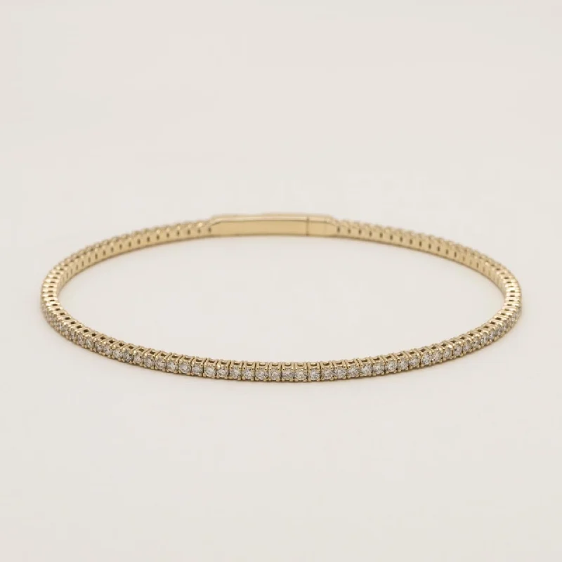 Elegant diamond bangles for women who love refined and luxurious jewelry styles -Diamond Flexible Bangle Bracelet in 14kt Yellow Gold (1 1/2ct tw)