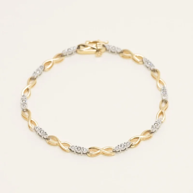 Fashionable stacked bracelets for a layered look with a mix of metals -Diamond Link Bracelet in 10kt Yellow and White Gold (1/2ct tw)