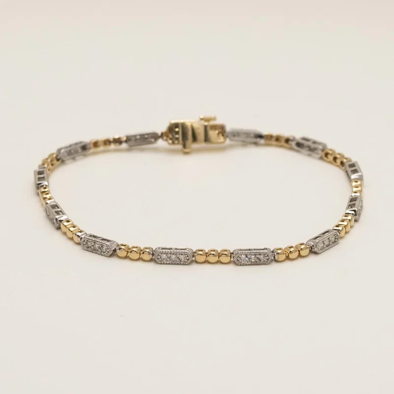 Layered gold bangles for women who love stacking accessories for a chic appearance -Diamond Link Bracelet in 14kt Yellow and White Gold (1/2ct tw)