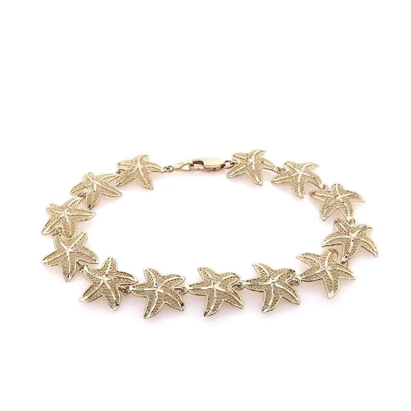 Vintage gold bangles with intricate patterns and detailing for a timeless style -Estate 14k Yellow Gold Diamond Cut Starfish Bracelet