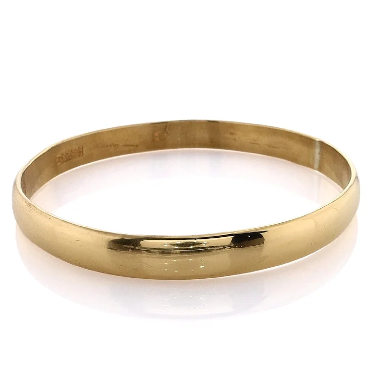 Unique twisted metal bangles with intricate details for a sophisticated, modern style -Estate 24 Karat Yellow Gold Polished Solid Slip On  Bangle Bracelet