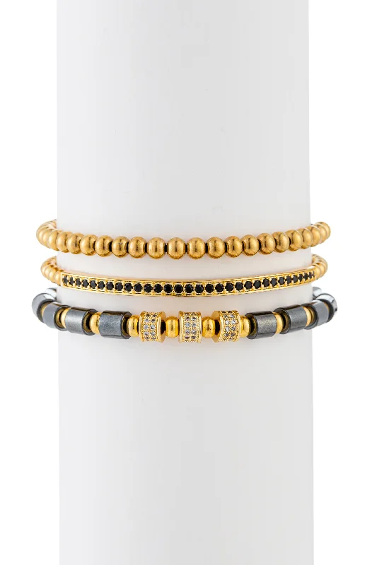 Layered gold bangles for women who love stacking accessories for a chic appearance -Ezra - Bracelet Set