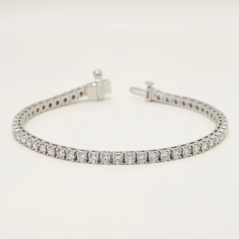 Vibrant gemstone bracelets for a unique, colorful pop of style in outfits -Lab Grown Diamond Tennis Bracelet in 14kt White Gold (5ct tw)