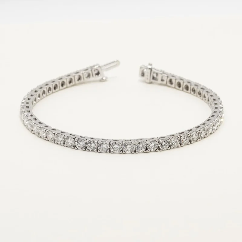 Pearl-studded bangles for a sophisticated, feminine accessory for special events -Lab Grown Diamond Tennis Bracelet in 14kt White Gold (8ct tw)