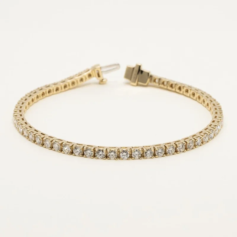 Personalized charm bangles for meaningful, custom jewelry that tells a story -Lab Grown Diamond Tennis Bracelet in 14kt Yellow Gold (5ct tw)