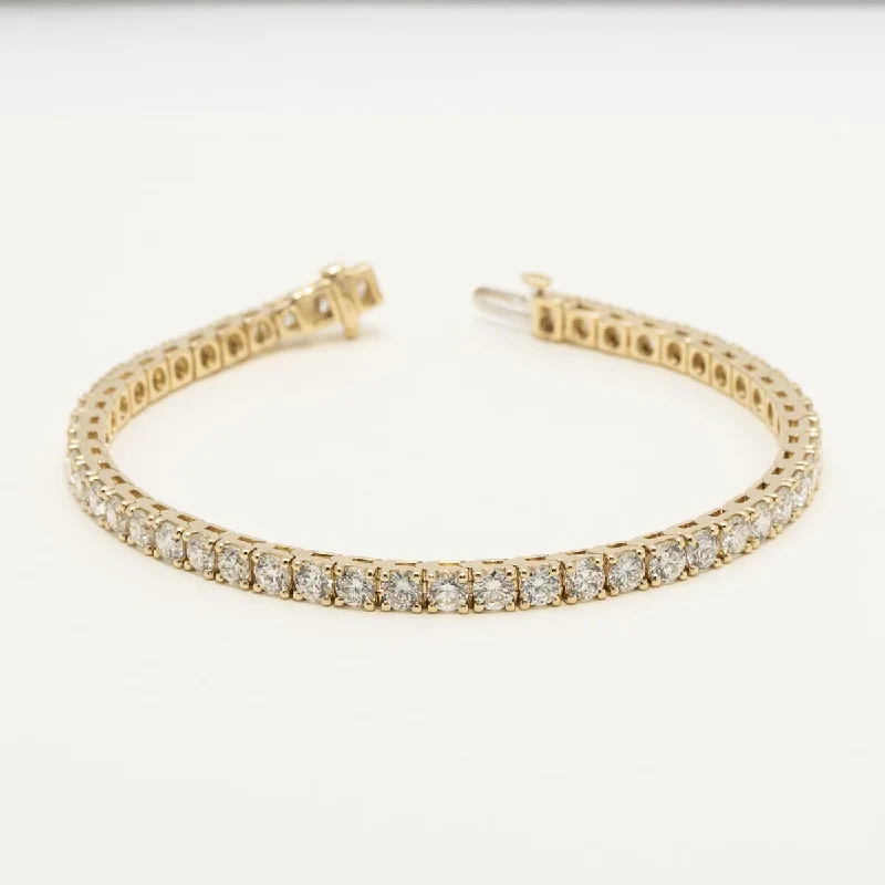 Simple link bracelets with clean lines and a classic design for any occasion -Lab Grown Diamond Tennis Bracelet in 14kt Yellow Gold (8ct tw)