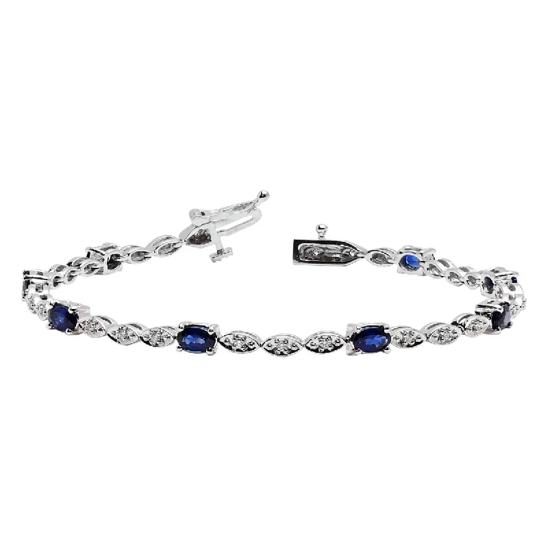 Adjustable cuff bangles for a perfect fit with custom designs and patterns -Oval Sapphire Bracelet in 14kt White Gold with Diamonds (1/5ct tw)