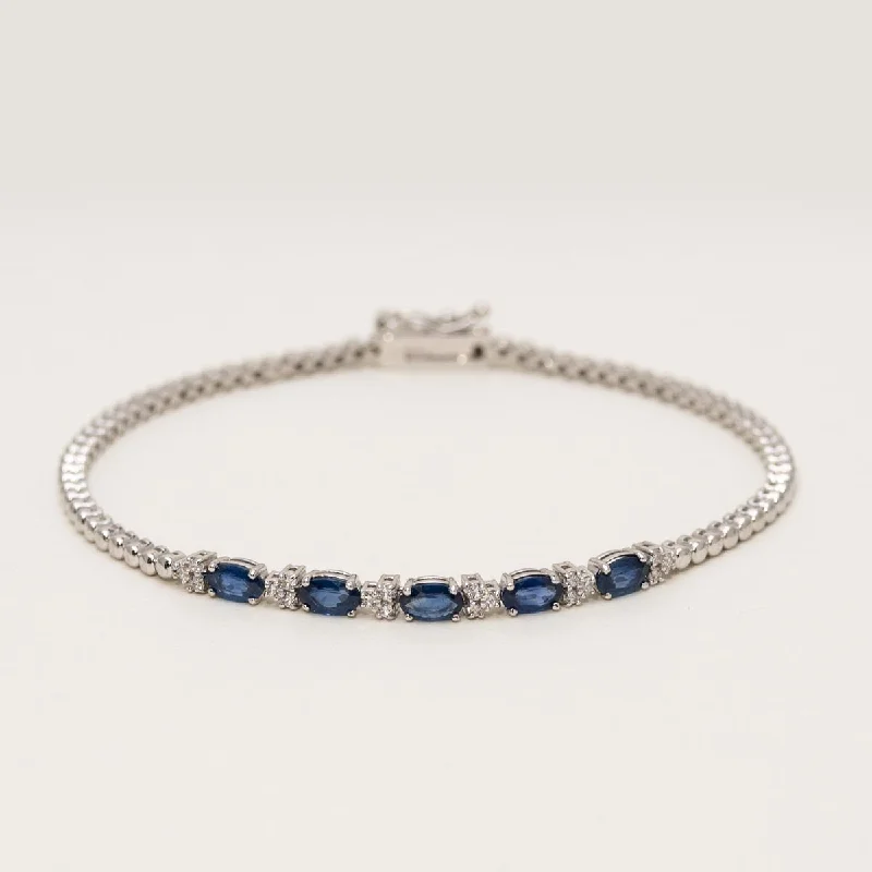 Modern mixed-metal bangles for women who love combining different metal tones -Oval Sapphire Bracelet in 14kt White Gold with Diamonds (1/7ct tw)