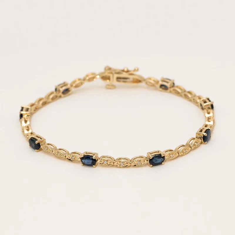 Trendy infinity bracelets for a meaningful symbol of endless love and connection -Oval Sapphire Bracelet in 14kt Yellow Gold (1/5ct tw)