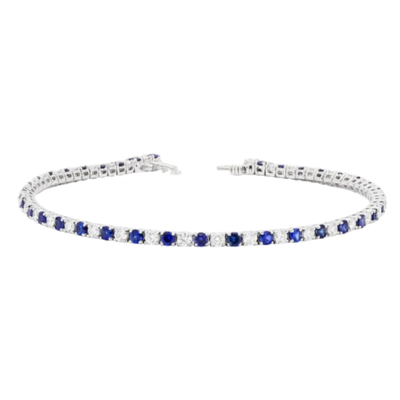 Antique brass bangles with vintage details for a historical, elegant accessory choice -Sapphire and Diamond Tennis Bracelet in 18kt White Gold (1 1/2ct tw)