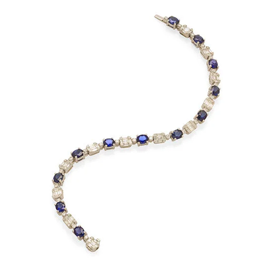 Vibrant gemstone bracelets for a unique, colorful pop of style in outfits -Sapphire & Diamond Tennis Bracelet