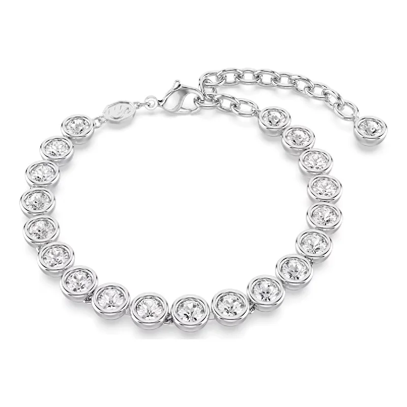 Stackable silver bangles for a coordinated and trendy layered jewelry look -Swarovski Imber Bezel Bracelet